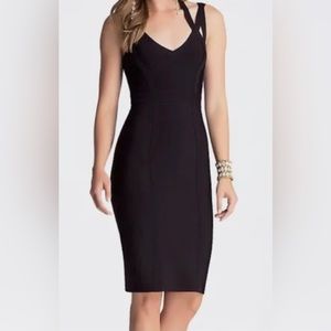 Black Bodycon 3 strap
Midi Dress by Bebe size SMALL